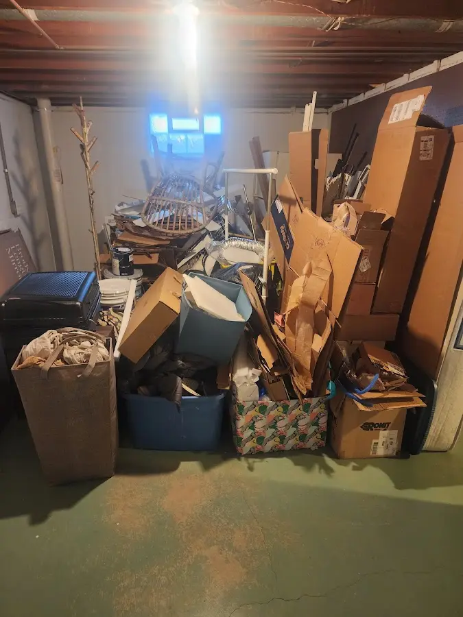 Roll-off dumpster container at job site for 2 Yard Dumpster Rental in Lake Elmo